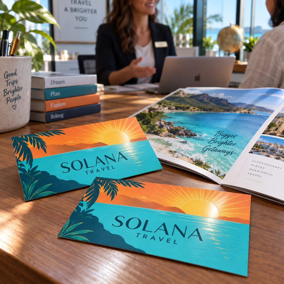 Colorful SOLANA Travel spot UV business cards on a travel consultation desk.